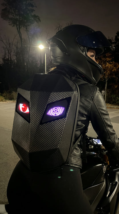 Rider wearing the RideGaze backpack at night